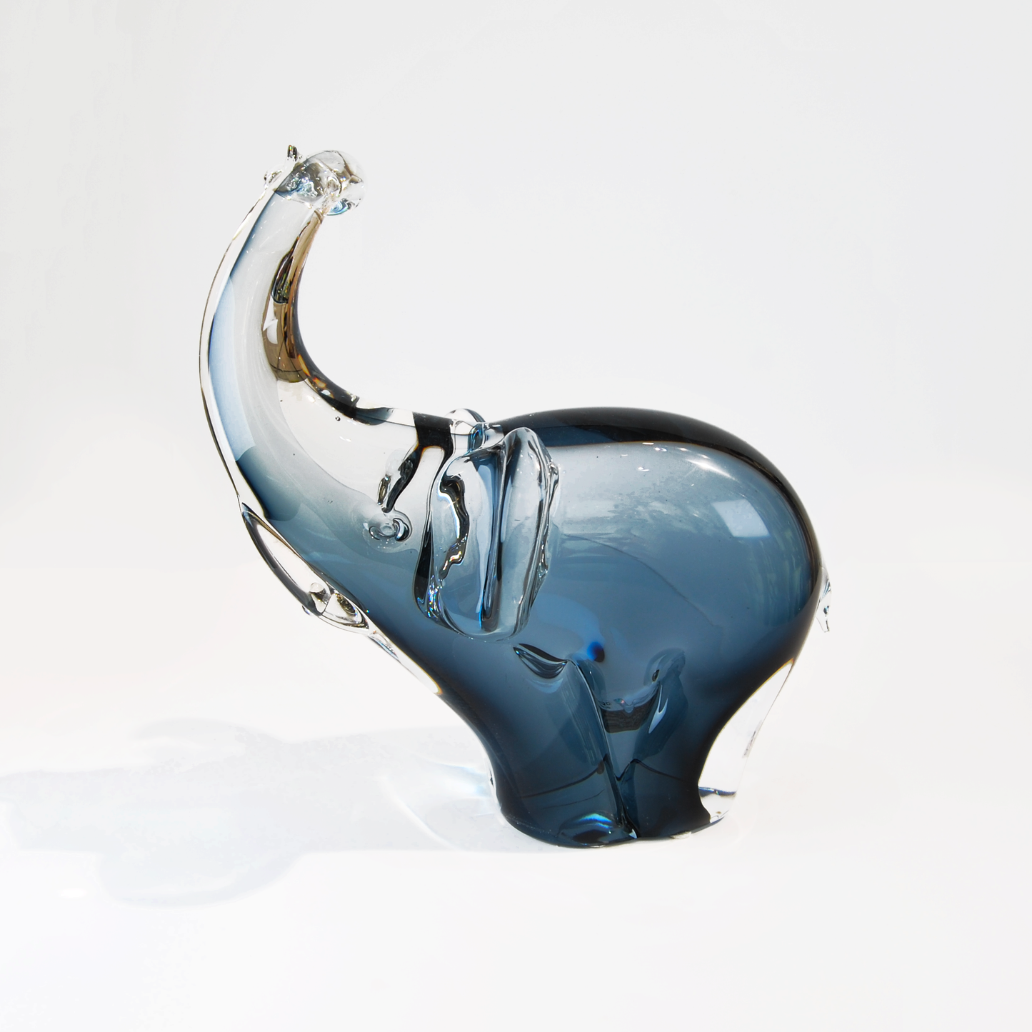MEDIUM ELEPHANT WITH TRUNK RAISED
