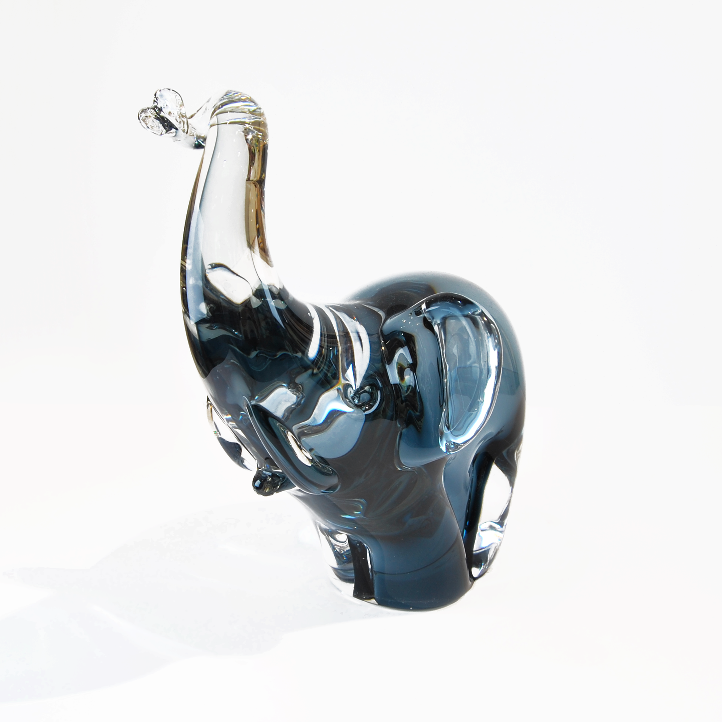 MEDIUM ELEPHANT WITH TRUNK RAISED