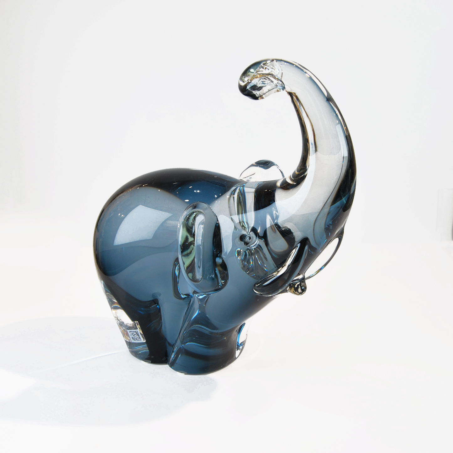 MEDIUM ELEPHANT WITH TRUNK RAISED
