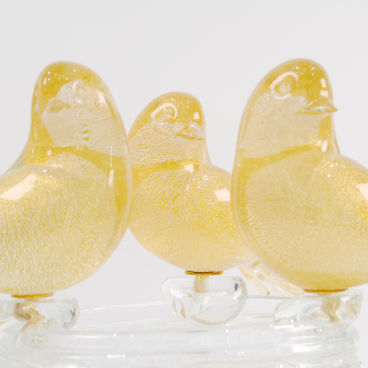 NEST WITH THREE GOLDEN BIRDS