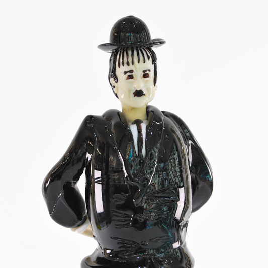 CHARLIE CHAPLIN IN BLACK SUIT